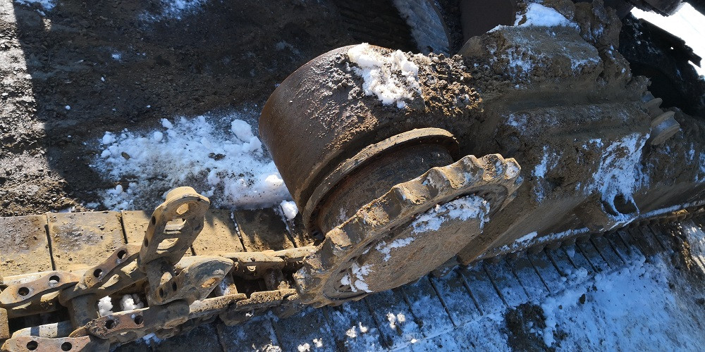 XCG 240 típusú kotrógép láncszem csere - Ketten Gép